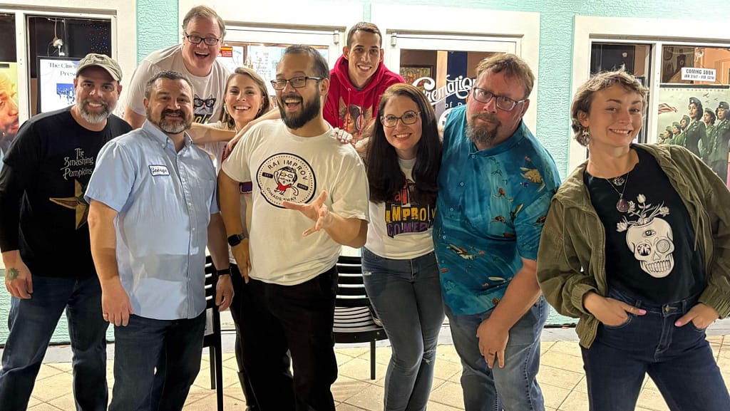 Daytona Beach's funniest improv comedy troupe, Random Acts of Insanity standing in front of Cinematique Theatre