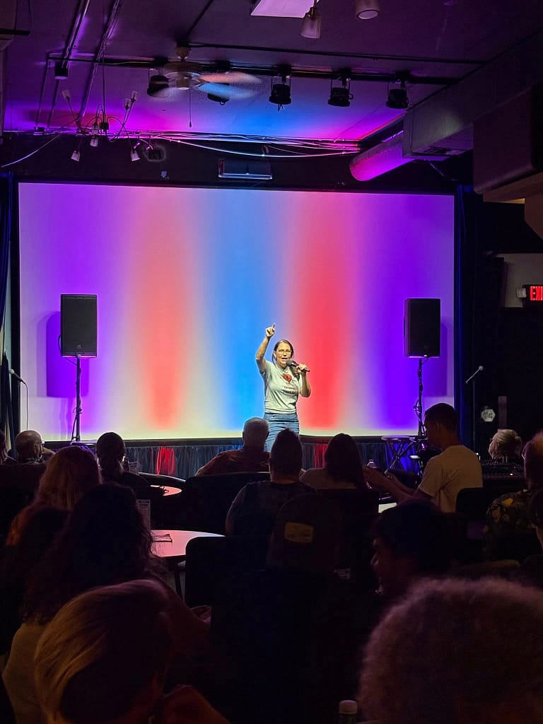 Dee Dee hosts Random Acts of Insanity's 3rd Saturday Stand-Up show at Cinematique Theatre